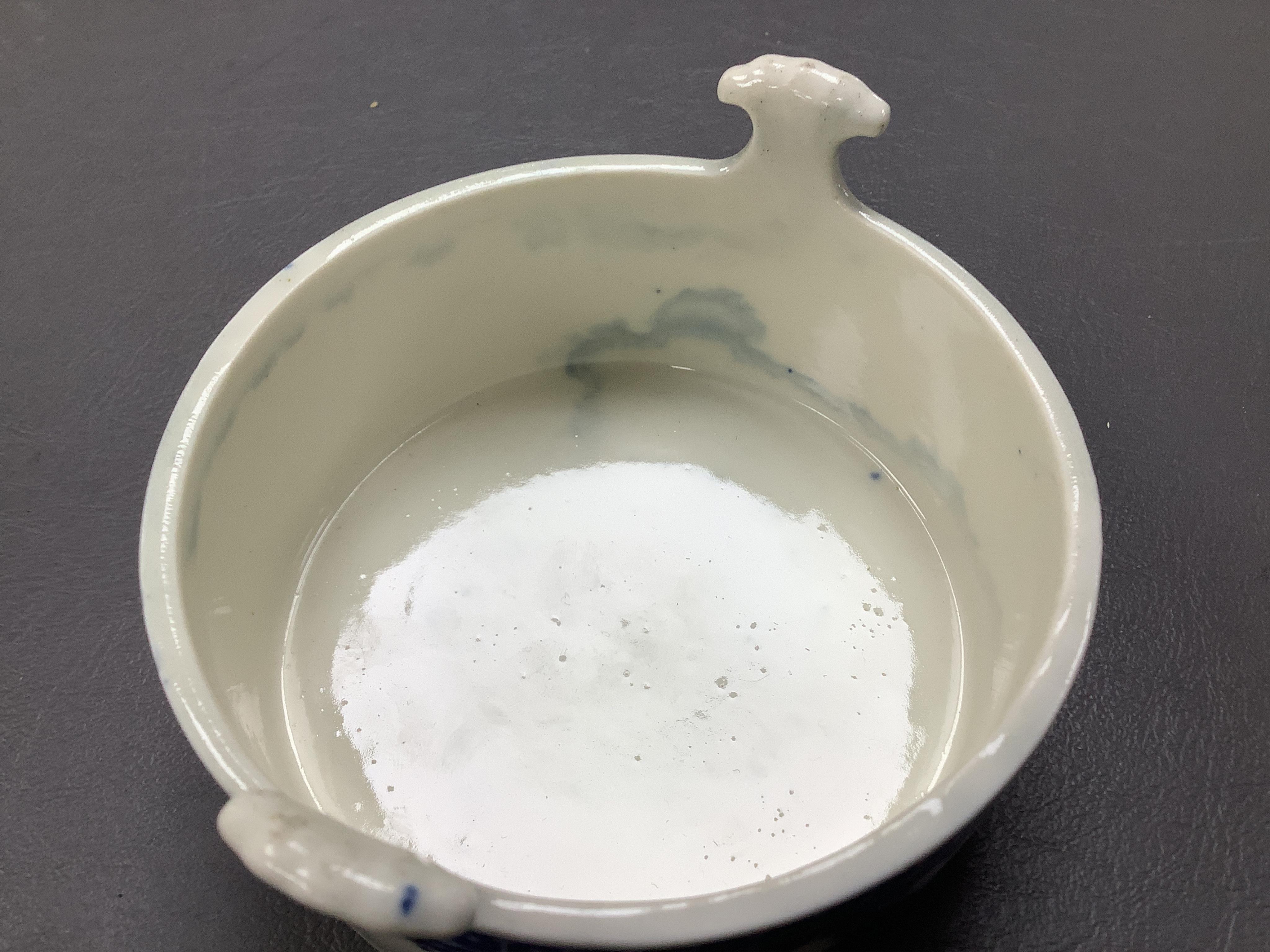 A group of 18th century Worcester and Liverpool porcelain teaware and a Caughley Cormorant fisherman butter tub and cover.